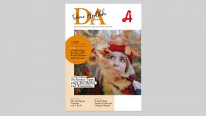 Eine Frau mit rotem Hut vor Herbstlaub, Magazin: Gesundheitstipps; Apotheke Laurentius/Arzl im Pitztal.
